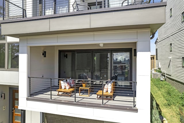 doorway to property with a balcony