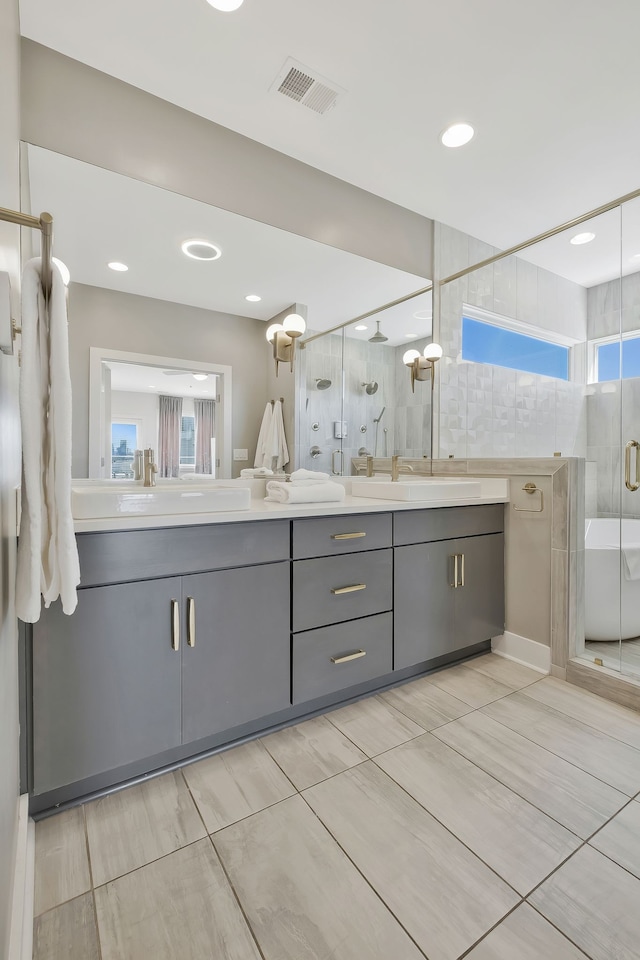 bathroom featuring walk in shower and vanity