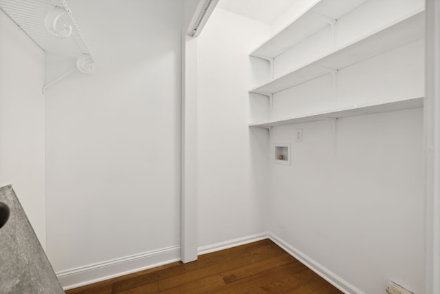 laundry room featuring hookup for a washing machine and dark hardwood / wood-style flooring