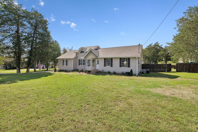 single story home featuring a front yard