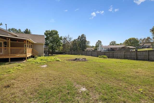 view of yard featuring a wooden deck