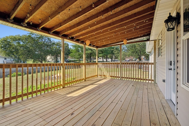 deck featuring a lawn