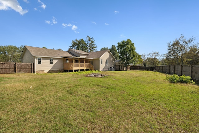 view of yard featuring a deck