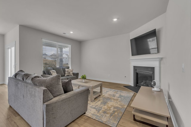 living room featuring light wood-type flooring