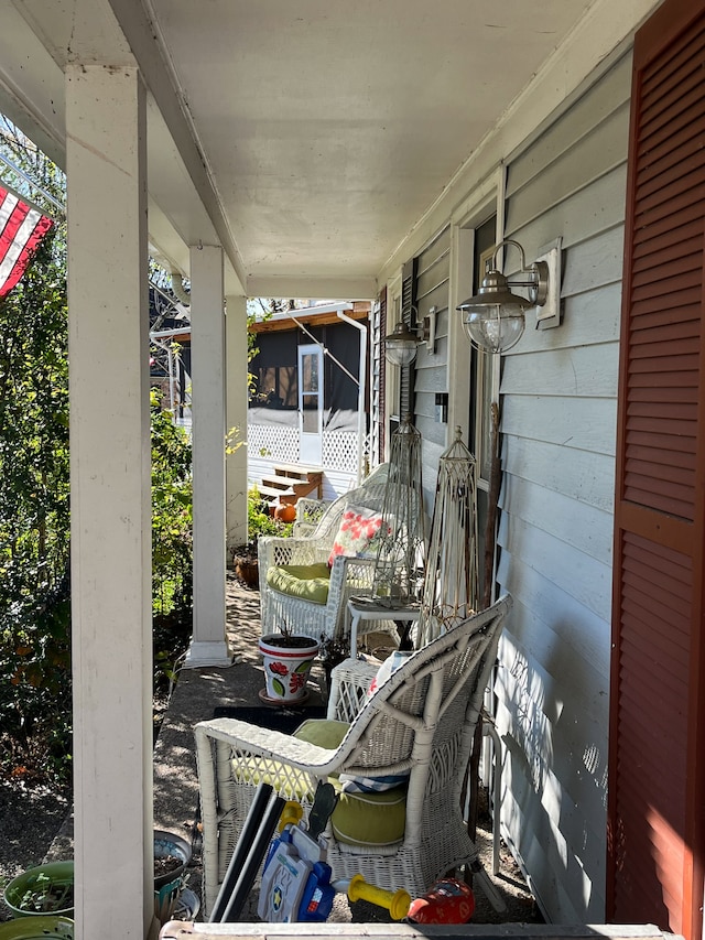 exterior space featuring a sunroom