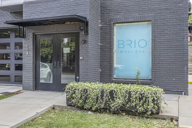 property entrance featuring french doors