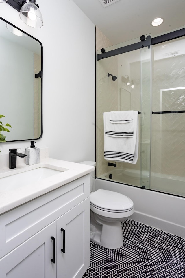 6821 Springwater St, Smyrna, TN 37167 - bathroom featuring toilet, shower / bath combination with glass door, recessed lighting, and vanity