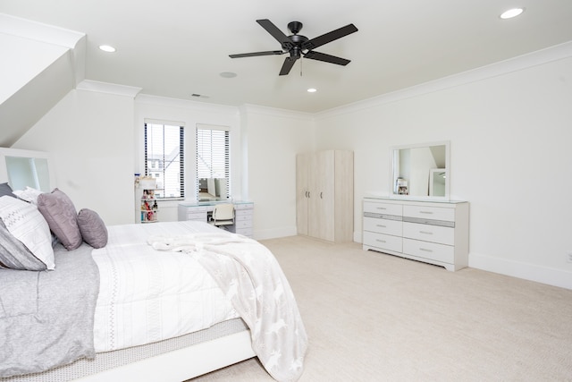 bedroom with crown molding, light carpet, and ceiling fan