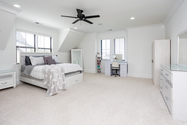 carpeted bedroom with ceiling fan, crown molding, and multiple windows