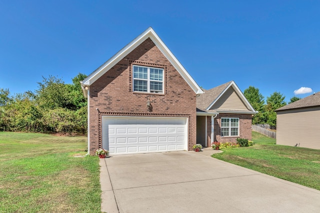 front of property featuring a garage and a front lawn