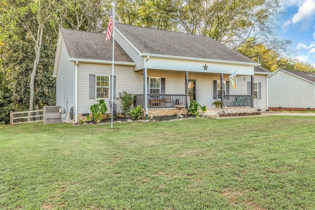 view of front of home with covered porch and a front yard