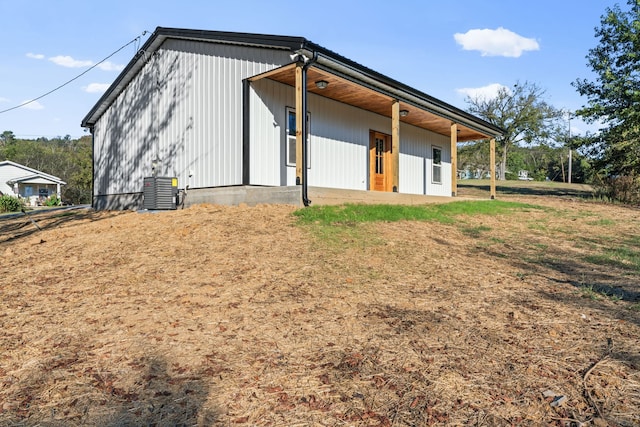 view of property exterior with cooling unit