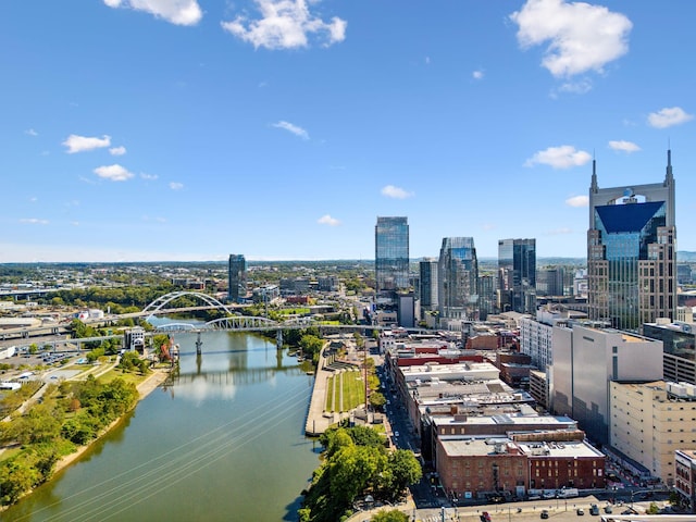 bird's eye view featuring a water view and a city view