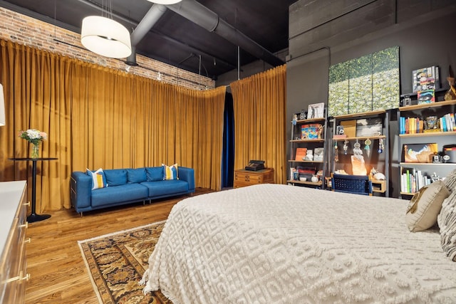 bedroom featuring wood finished floors