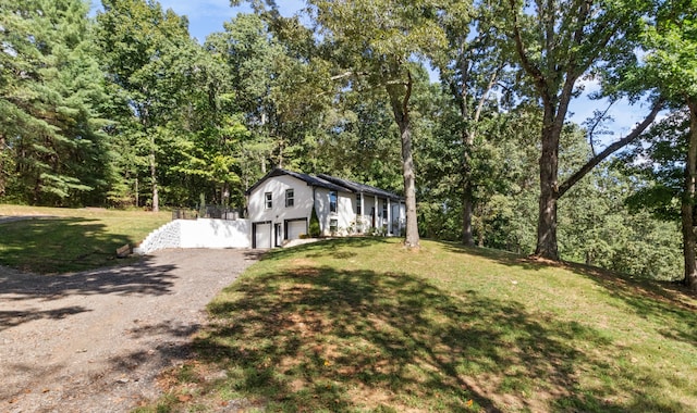 view of yard featuring a garage