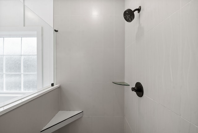 details with a tile shower