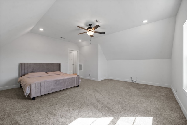 bedroom with light carpet, lofted ceiling, and ceiling fan