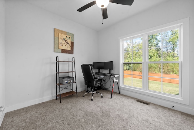 office space with carpet floors and ceiling fan