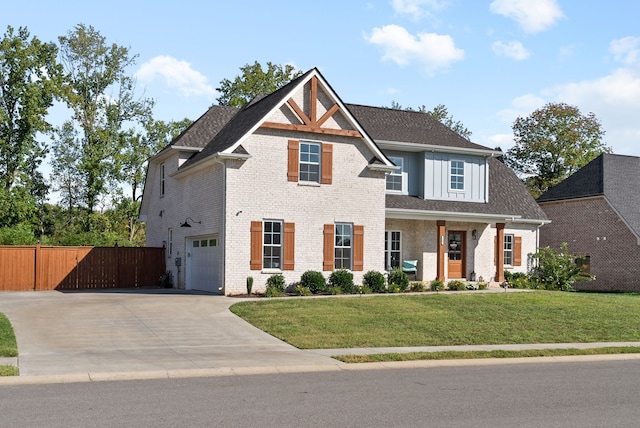 view of front of house featuring a garage and a front yard