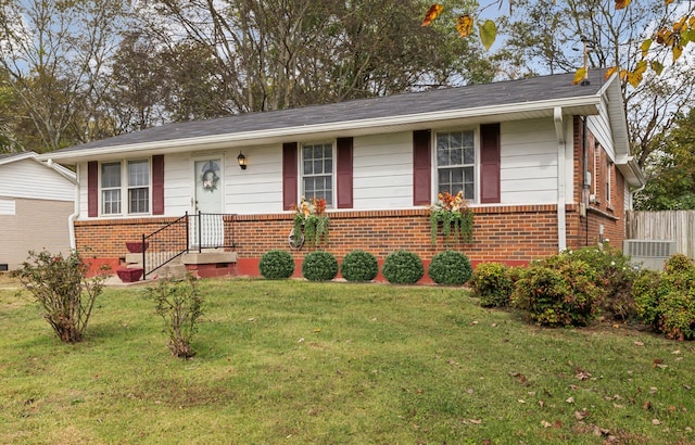 ranch-style house with a front lawn