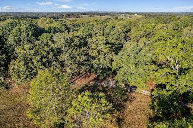 bird's eye view featuring a view of trees