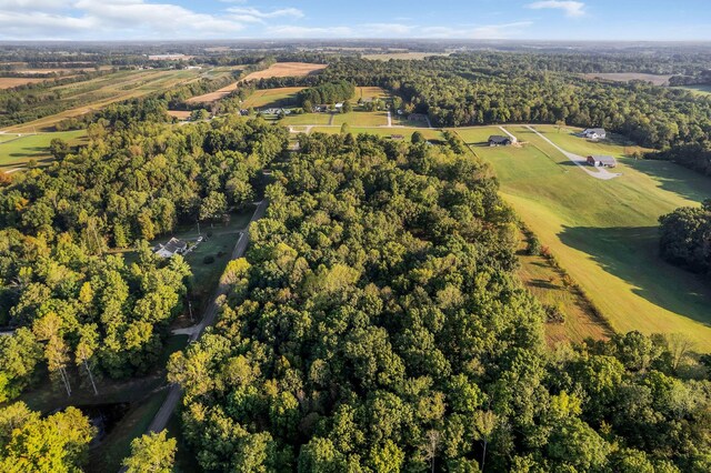 drone / aerial view with a view of trees