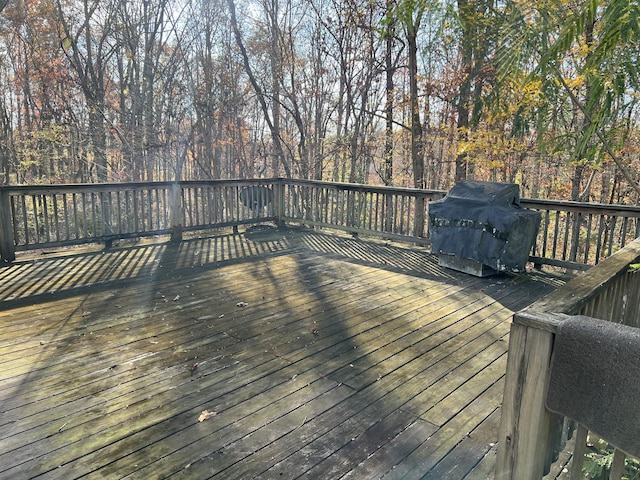 wooden terrace with grilling area