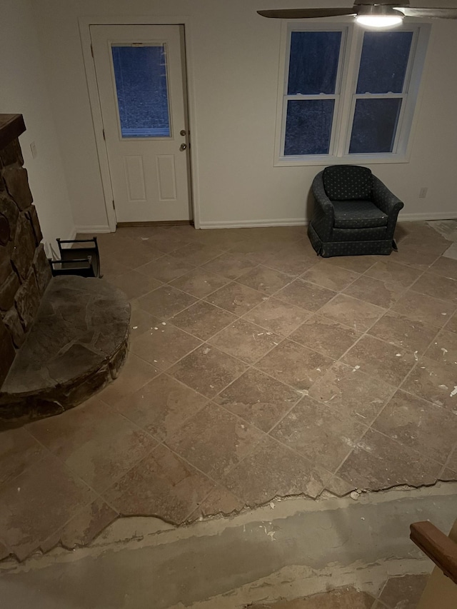 sitting room featuring baseboards