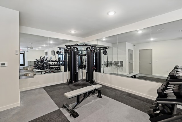 exercise room with ceiling fan