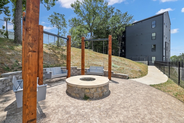 view of patio / terrace with an outdoor fire pit