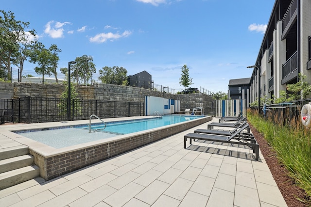 view of pool with a patio area