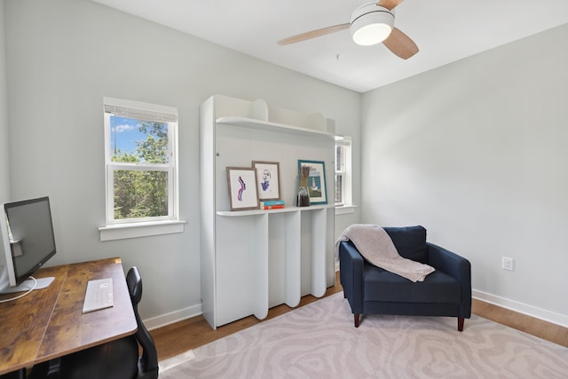 office area featuring ceiling fan and hardwood / wood-style floors