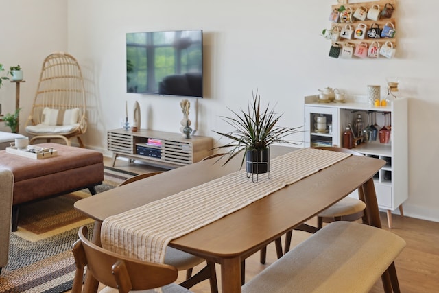 dining area with light wood-type flooring