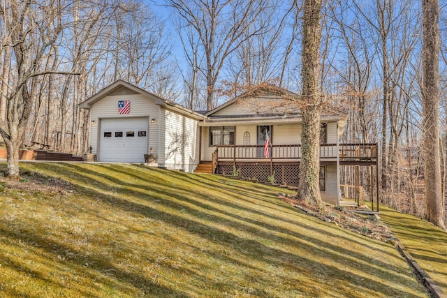 view of front facade with a front yard and a garage