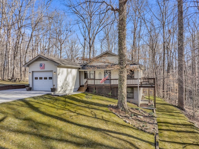 view of front of home with a garage, a wooden deck, and a front lawn