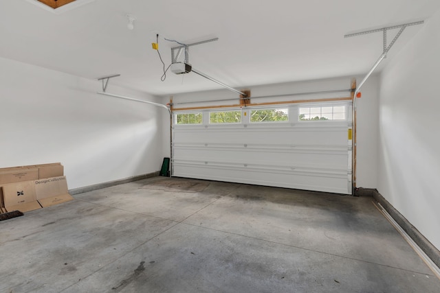 garage featuring a garage door opener