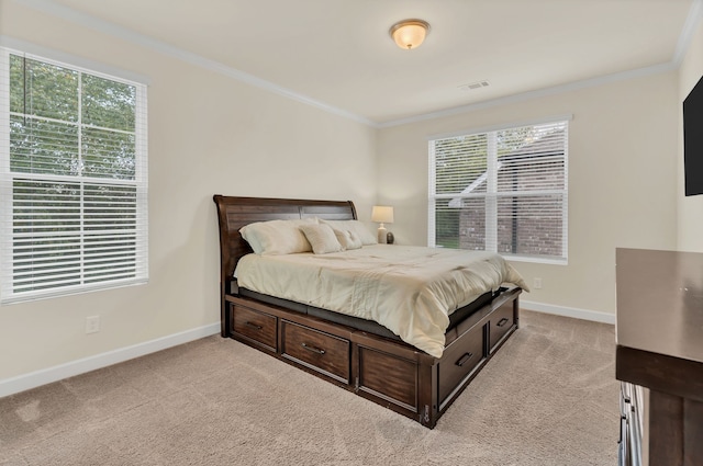 carpeted bedroom with crown molding