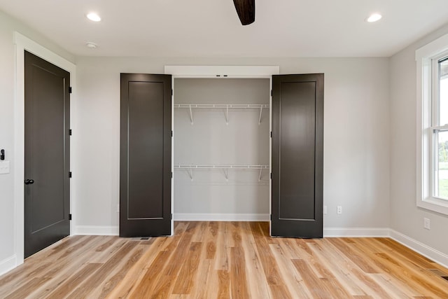 unfurnished bedroom featuring recessed lighting, light wood-style floors, a closet, ceiling fan, and baseboards