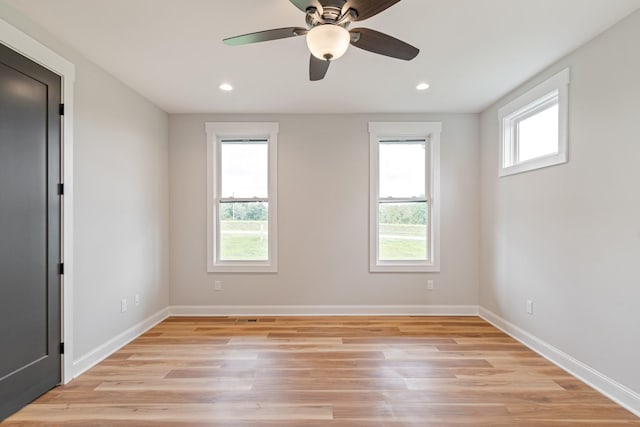 empty room featuring recessed lighting and a healthy amount of sunlight
