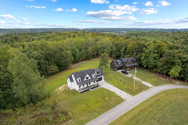 bird's eye view with a forest view