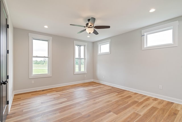 unfurnished room with baseboards, recessed lighting, a ceiling fan, and light wood finished floors