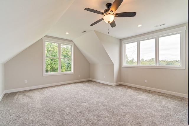 bonus room with visible vents, ceiling fan, carpet, and vaulted ceiling