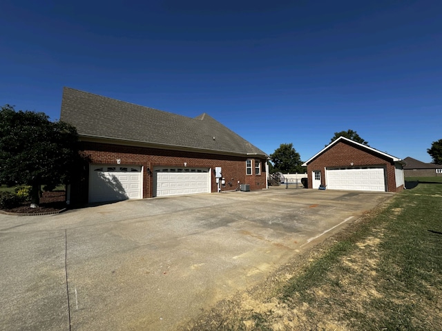 view of side of property featuring a garage