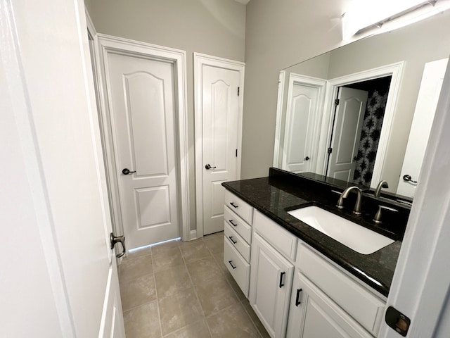 bathroom featuring vanity and tile patterned flooring