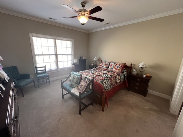 bedroom featuring carpet floors, crown molding, and ceiling fan