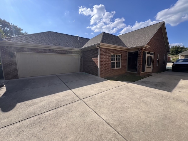 ranch-style home with a garage