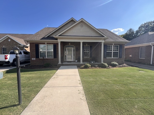 view of front of home with a front lawn