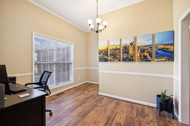 office with a notable chandelier, dark hardwood / wood-style floors, and ornamental molding