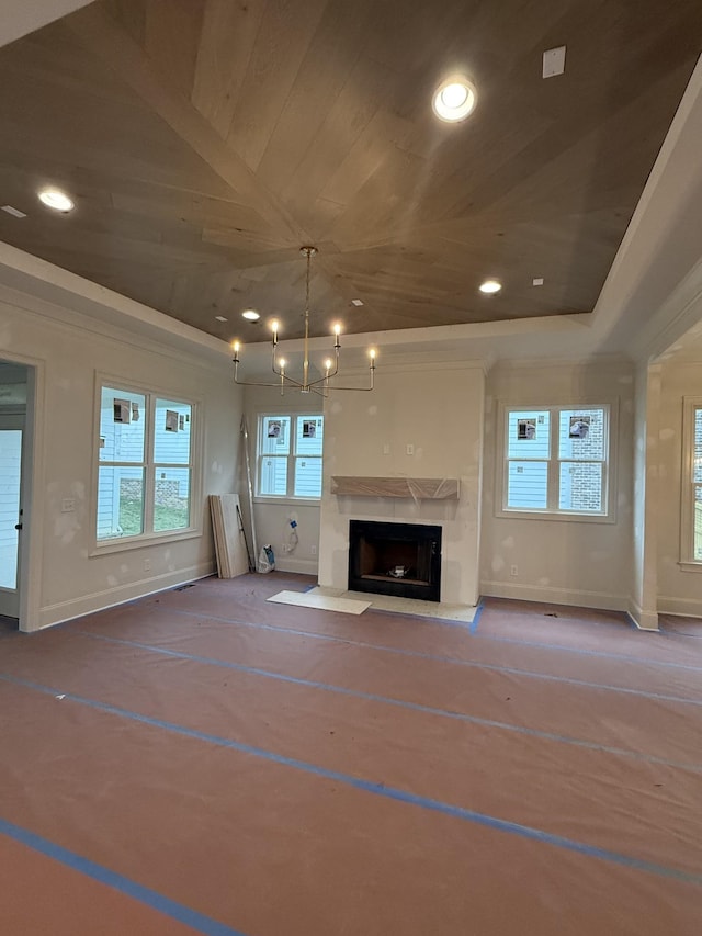 unfurnished living room featuring wooden ceiling, vaulted ceiling, and an inviting chandelier