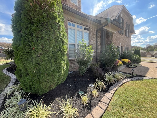 view of property exterior featuring a yard